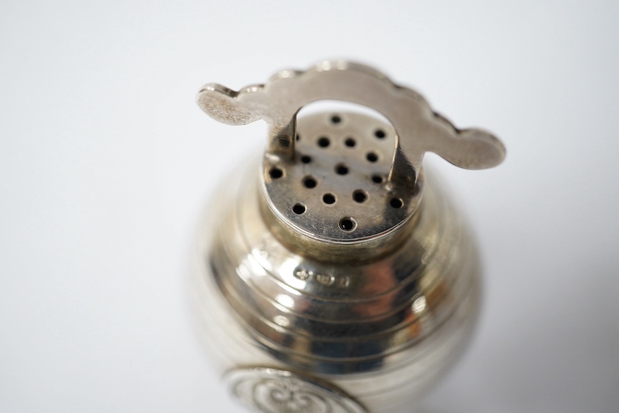 A Georgian silver mounted cut glass caster, London, 1818, 15.7cm, together with a Japanese silver condiment on tripod supports, import marks for Harrods Ltd, London, 1920. Condition - poor to fair